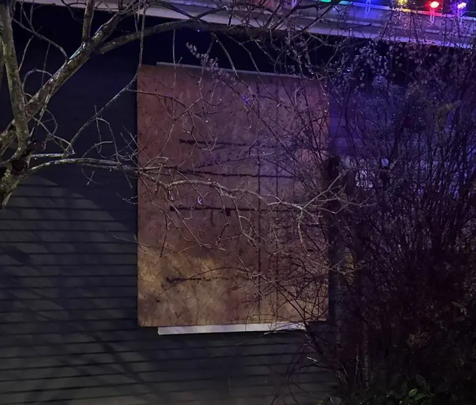 late evening emergency residential window boardup