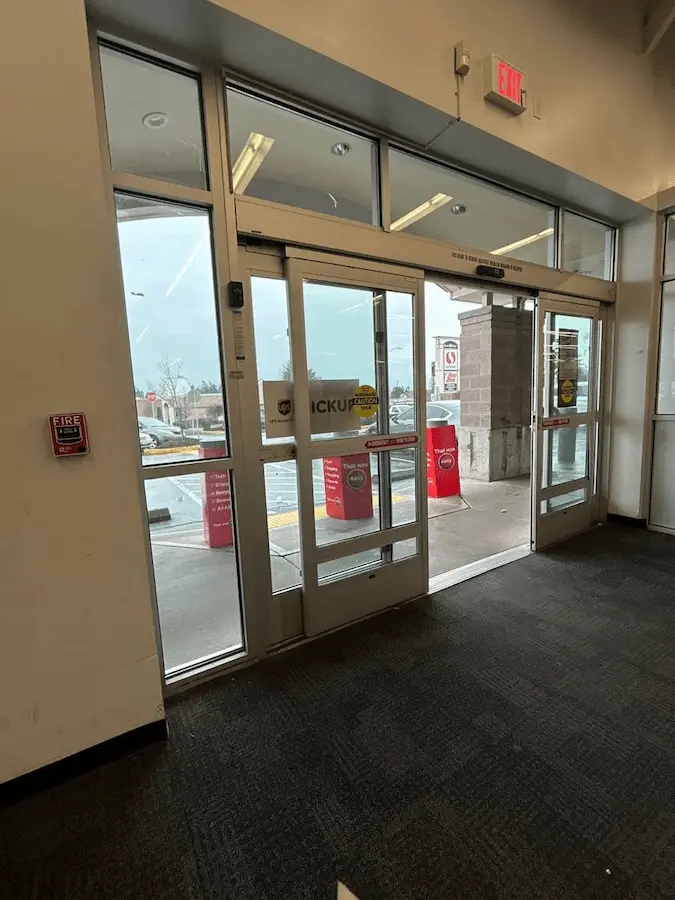 ups storefront automatic glass door that is open