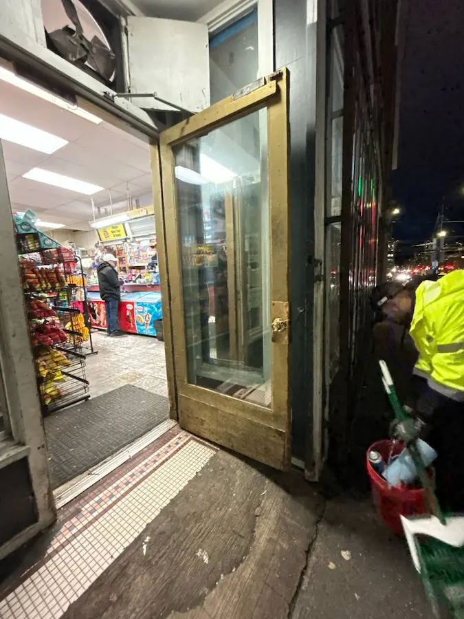 convenience storefront door with replaced glass