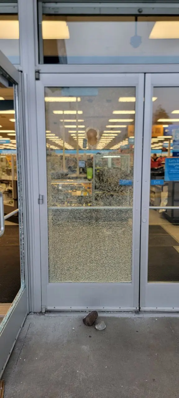 storefront door with broken glass
