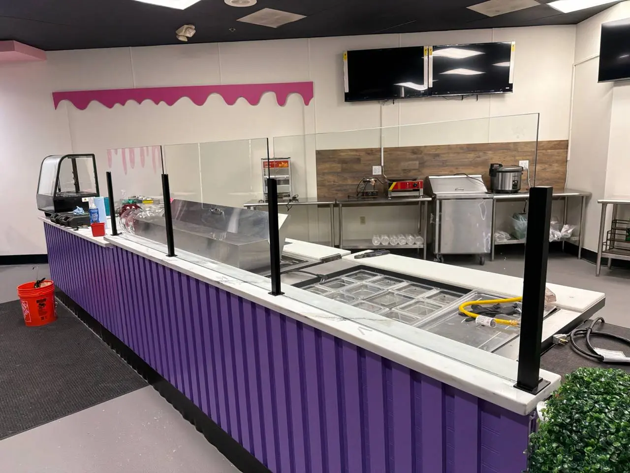 Completed counter glass partition with square black posts