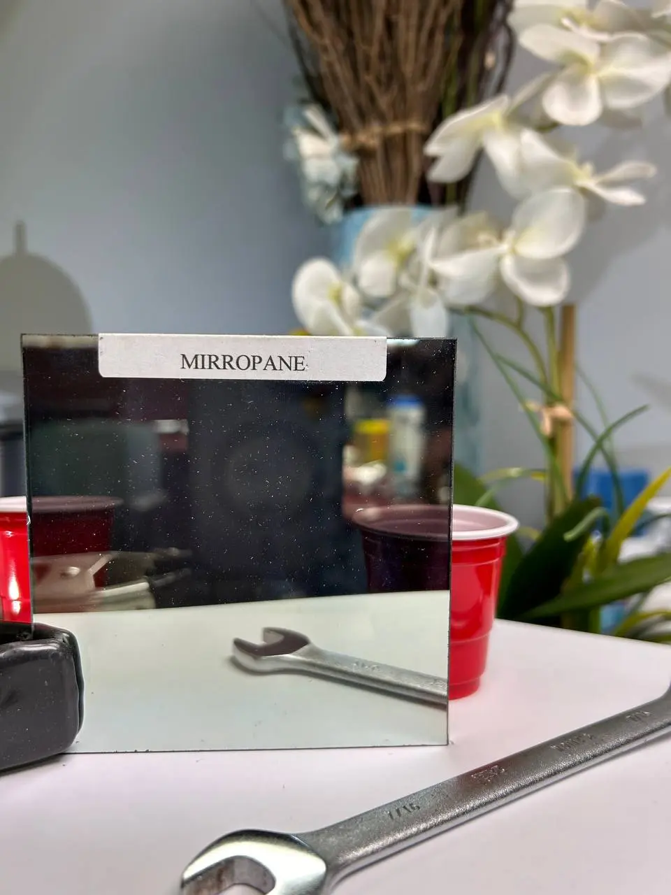 Mirror-like reflective glass for privacy, display, decorative wall, or specialty panel use.