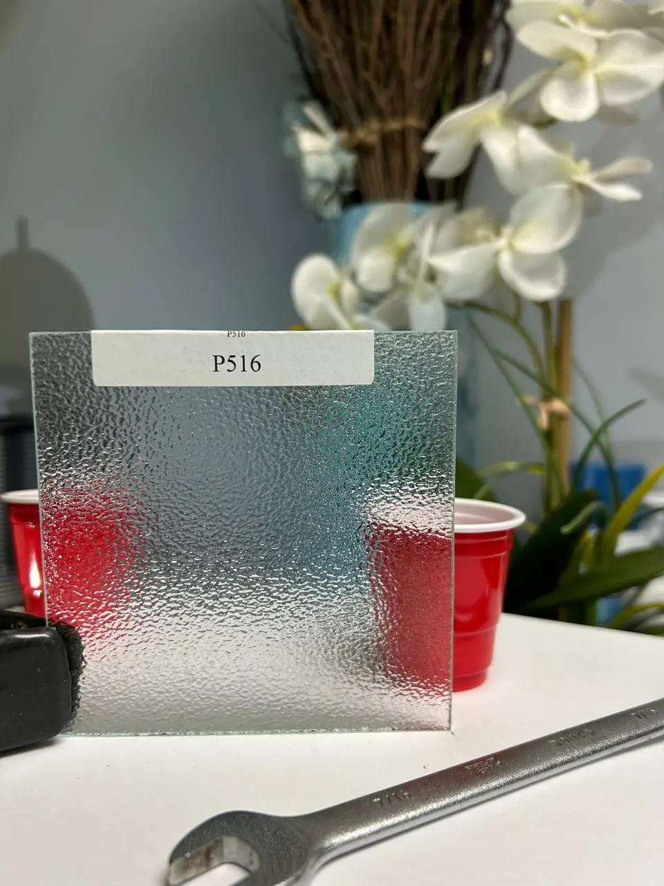 Fine pebbled obscure glass for privacy where light transmission still matters.